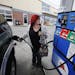 Sara Hendrickson of Coon Rapids tried to fill up her SUV at Highway 10 Mobil in Coon Rapids but discovered it was prepay only or credit card Wednesday