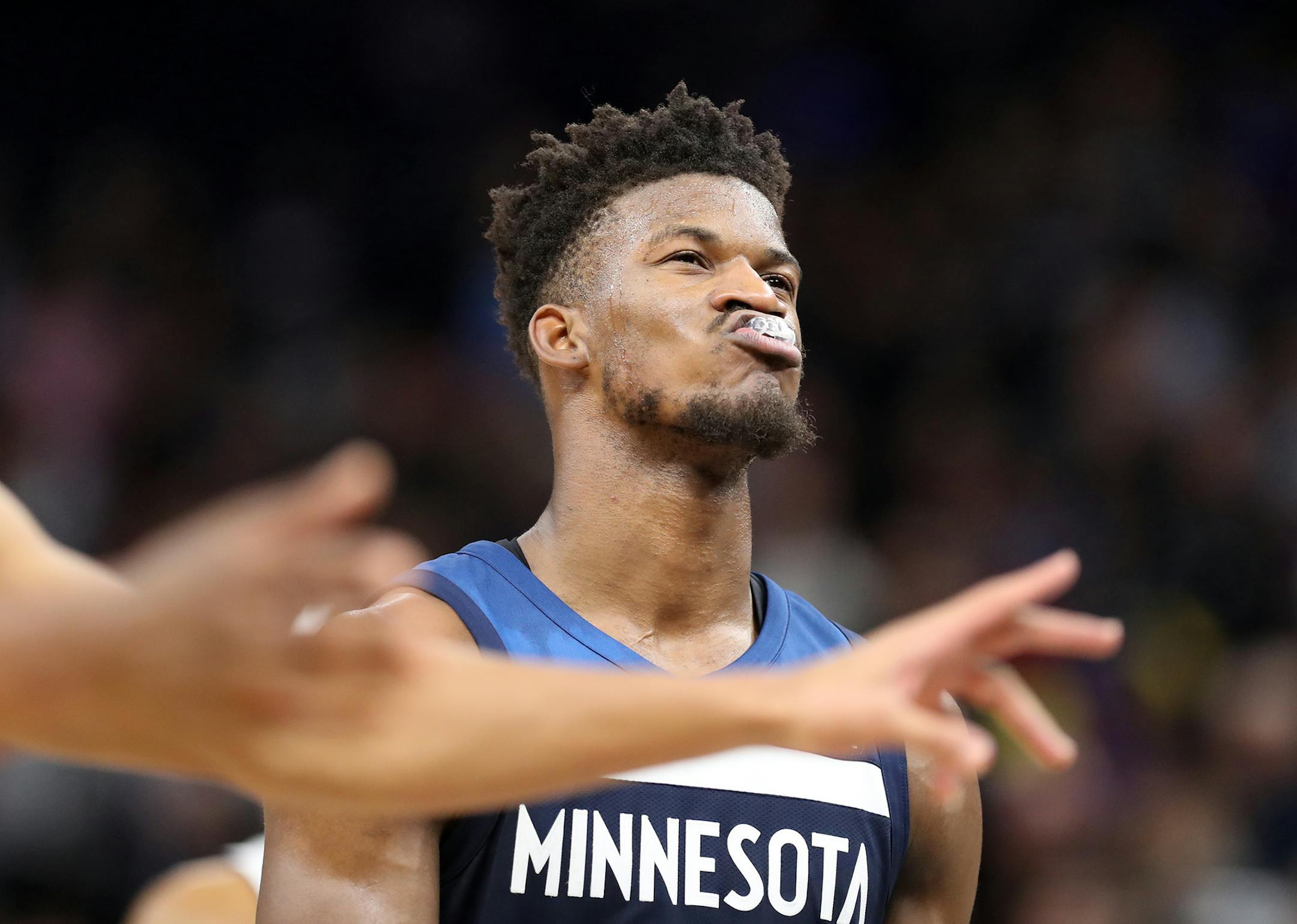 Minnesota Timberwolves guard Jimmy Butler (23) reacts after missing his third free throw shot during the second half.