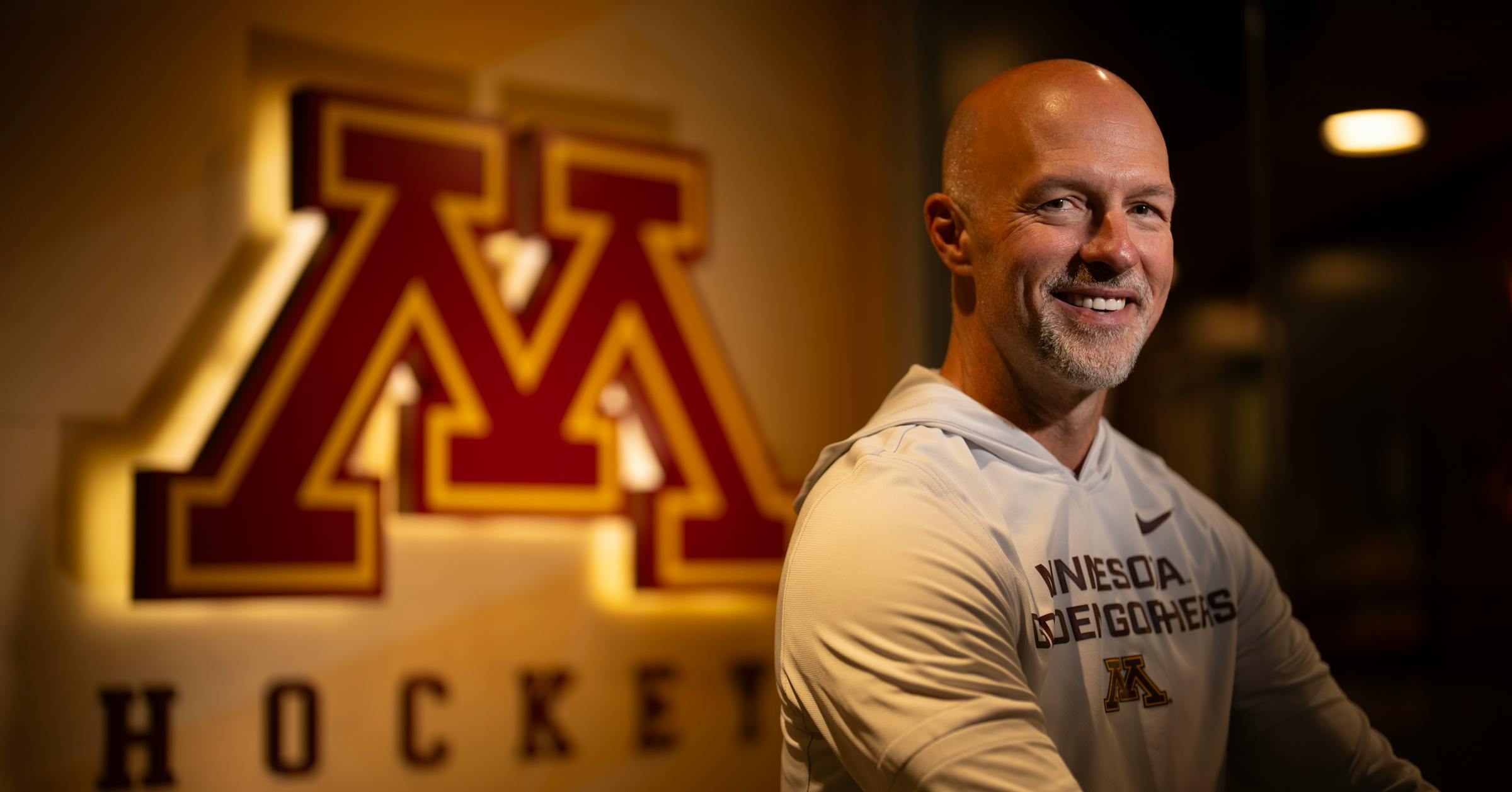 The new men's hockey coach grew up in blue-collar West Duluth, but he's excited to lead a blue-blood program.