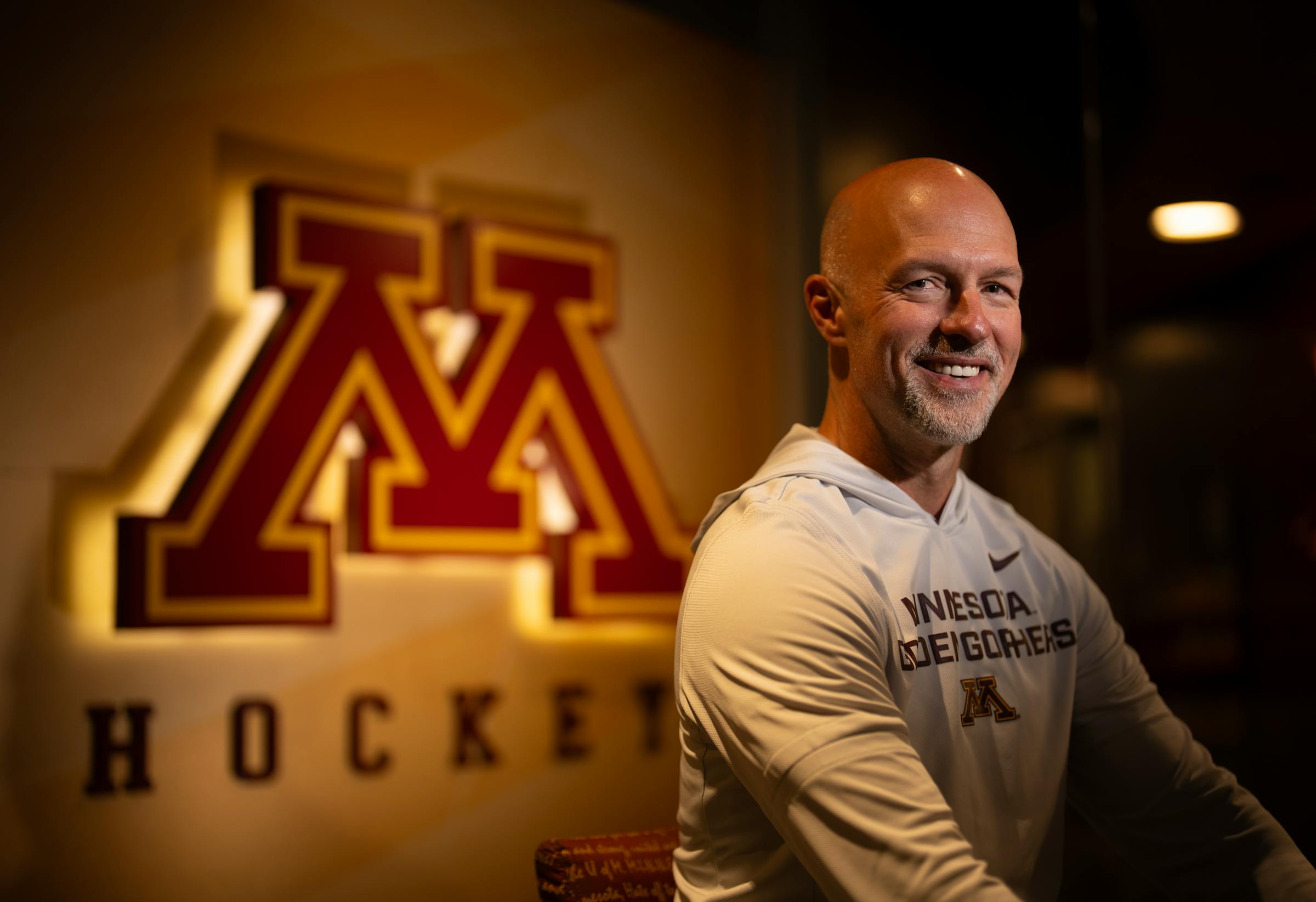 The new men's hockey coach grew up in blue-collar West Duluth, but he's excited to lead a blue-blood program.