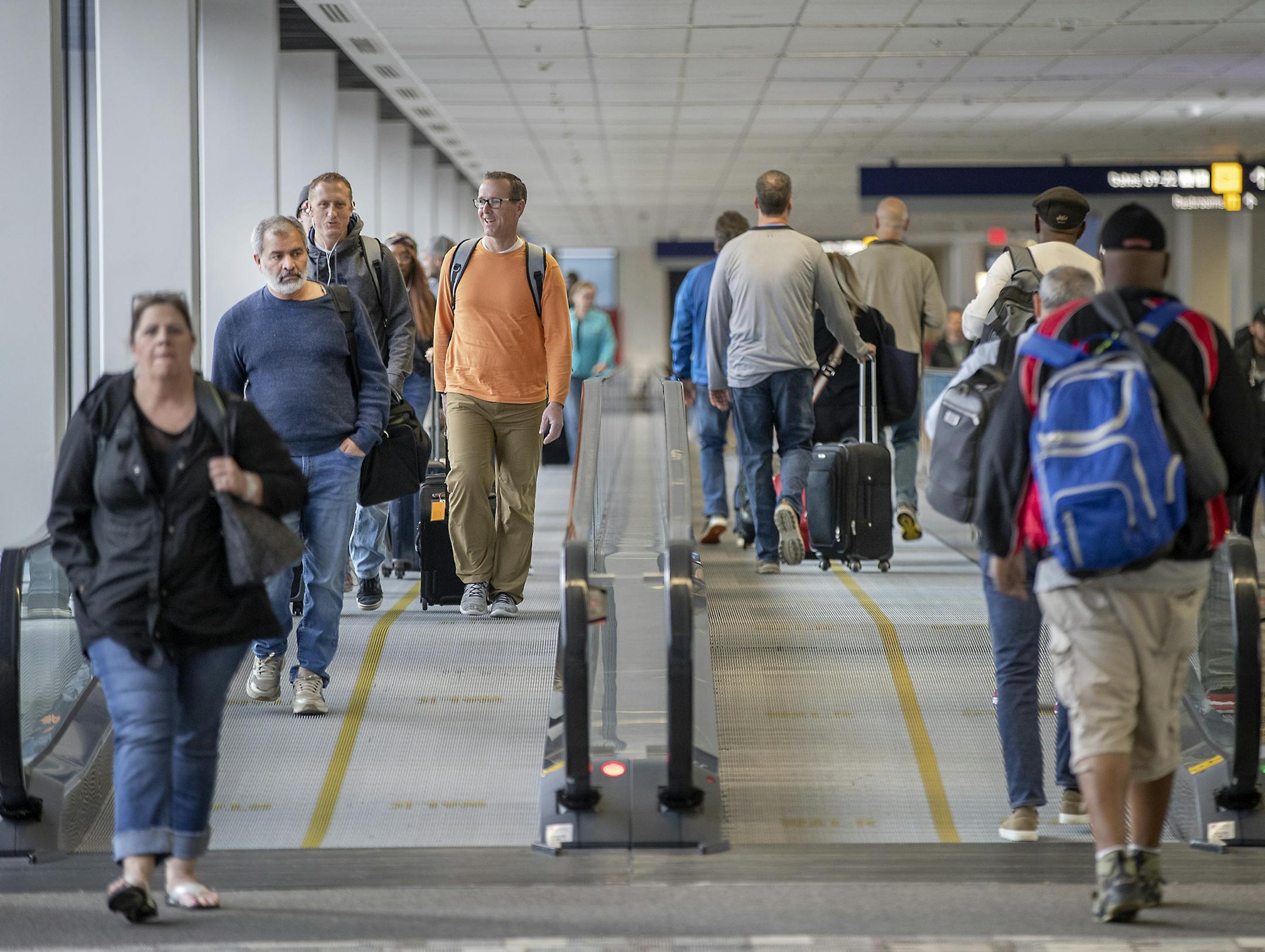 Travelers made their way through Terminal 1 at the Minneapolis/St. Paul International Airport, Thursday ahead of Memorial Day weekend.