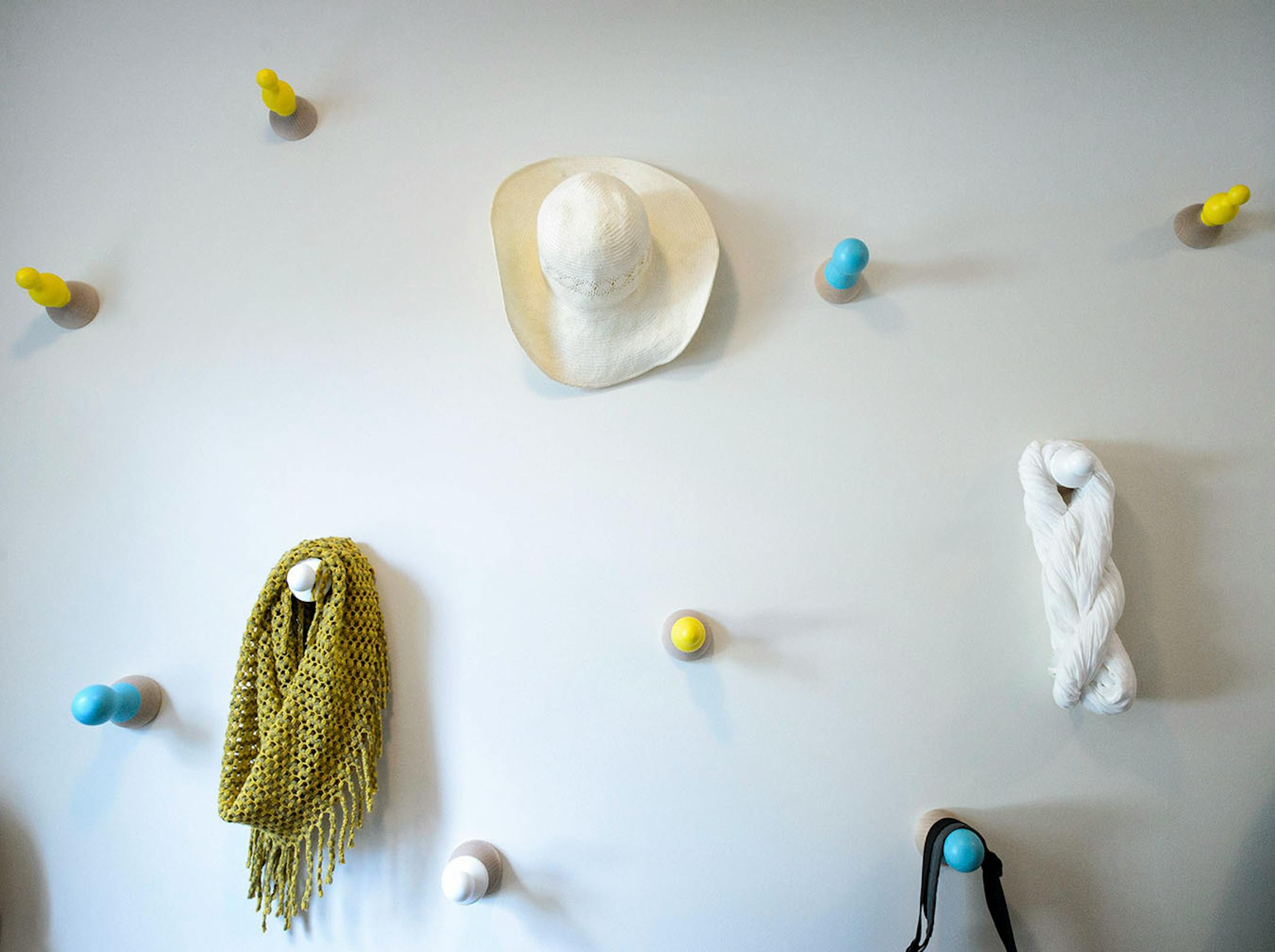 Hanging pegs in the mud room that was part of the Artisan Home Tour.
