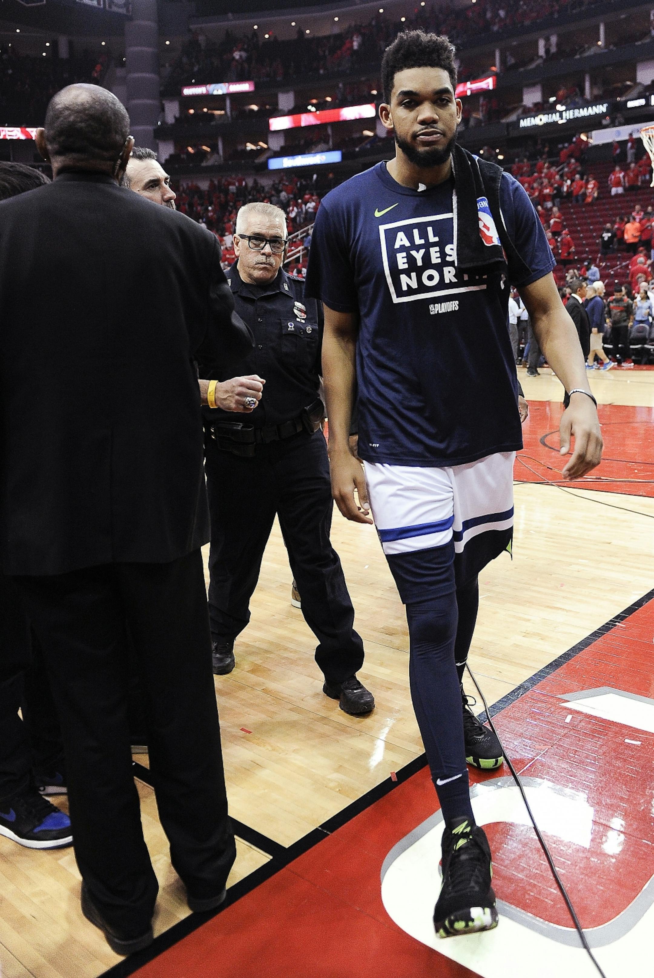 Minnesota Timberwolves' Karl-Anthony Towns walks off the court after the team's 122-104 loss to the Houston Rockets in Game 5 of a first-round NBA basketball playoff series Wednesday, April 25, 2018, in Houston.