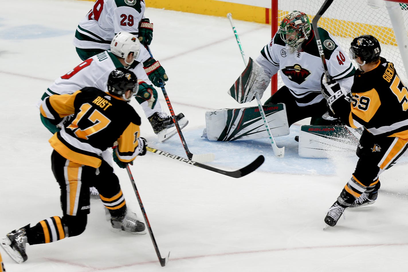 Pittsburgh's Bryan Rust (17) scored his second goal of the night on Wild goaltender Devan Dubnyk during the third period