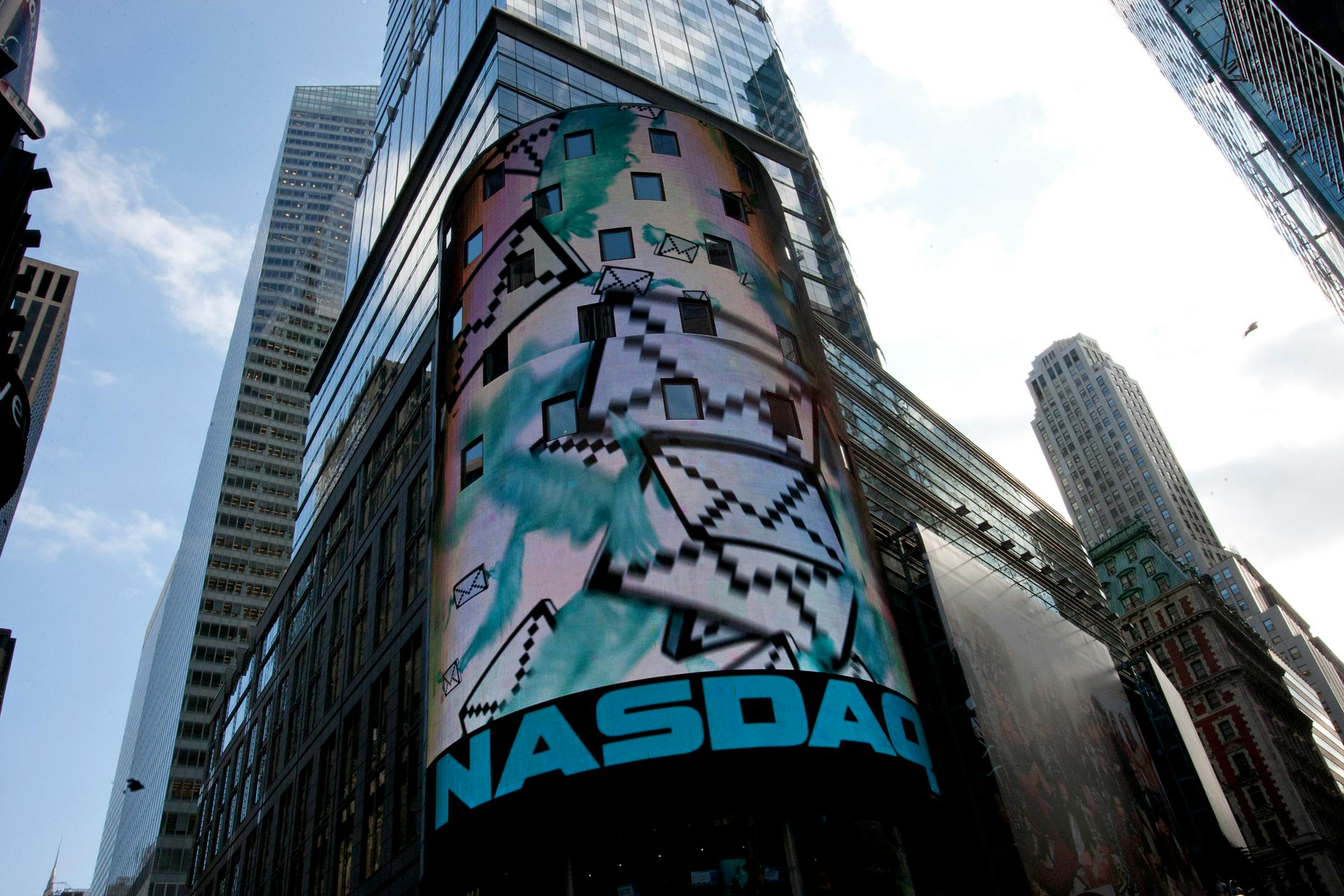 The Nasdaq MarketSite stands in New York, U.S., on Wednesday, Feb. 1, 2012. Nasdaq OMX Group Inc. and NYSE Euronext, rivals for almost every initial public offering in America, are competing now for the Facebook Inc. IPO, which may be the biggest ever by a technology company. Photographer: Scott Eells/Bloomberg