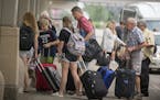 Travelers were dropped off curbside to the Humphrey terminal, Wednesday, June 20, 2018 in Bloomington, MN. ] ELIZABETH FLORES &#xef; liz.flores@startr