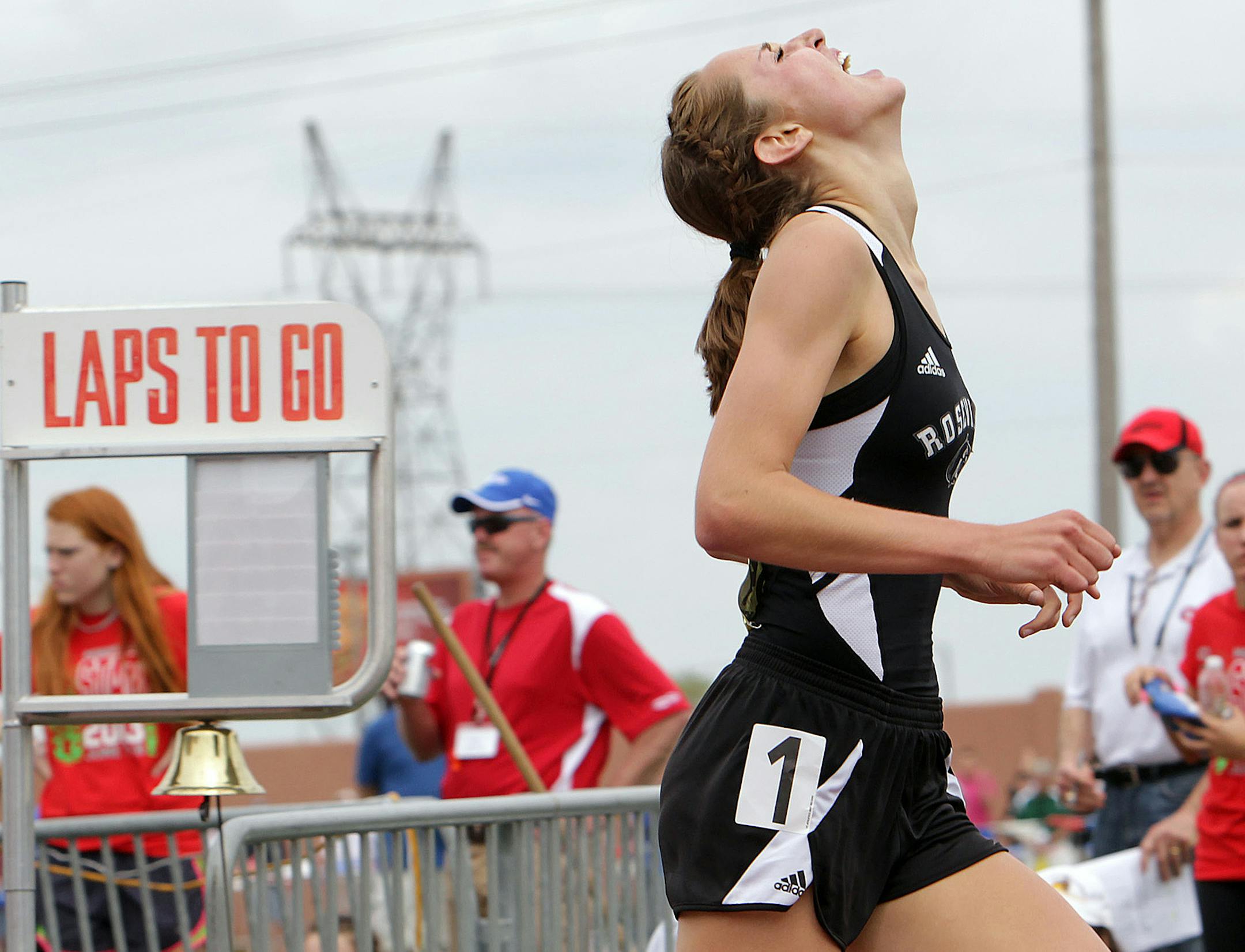 Samantha Nielsen of Roseville throws her head back after winning first place in the Class 2A girls 800-meter run at the 2013 State Track and Field Meet at Hamline University in St. Paul June 8, 2013. (Courtney Perry/Special to the Star Tribune)