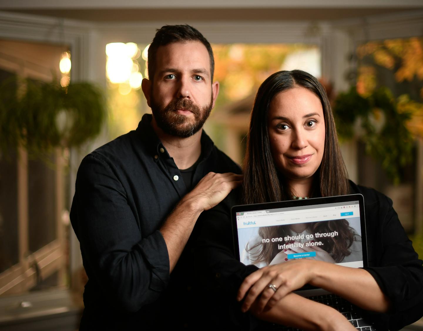 Elyse and Brad Ash stood for a portrait at their home on Wednesday, Oct. 18, 2017. ] AARON LAVINSKY &#xef; aaron.lavinsky@startribune.com A local couple has launched a new website to support men and women who want to have children but are infertile. We photograph Elyse and Brad Ash on Wednesday, Oct. 18, 2017 in their home in Minneapolis.