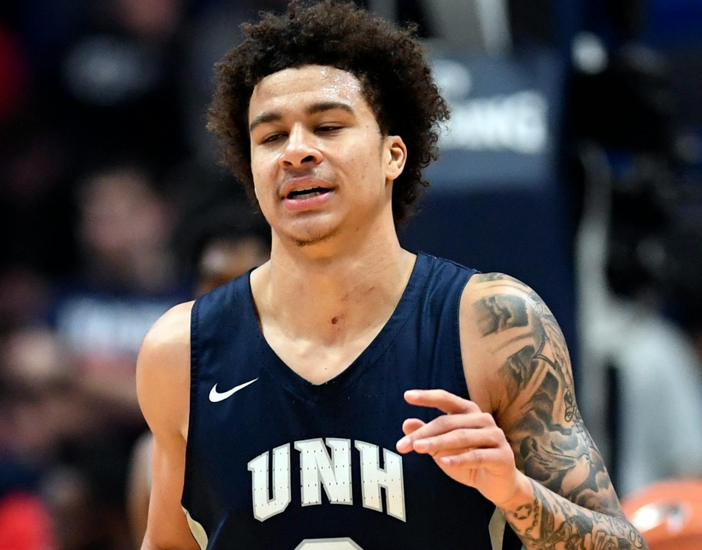 New Hampshire's Sean Sutherlin (2) heads downcourt during an NCAA college basketball game against Connecticut Sunday, Dec. 22, 2019, in Hartford, Conn. (AP Photo/Stephen Dunn)