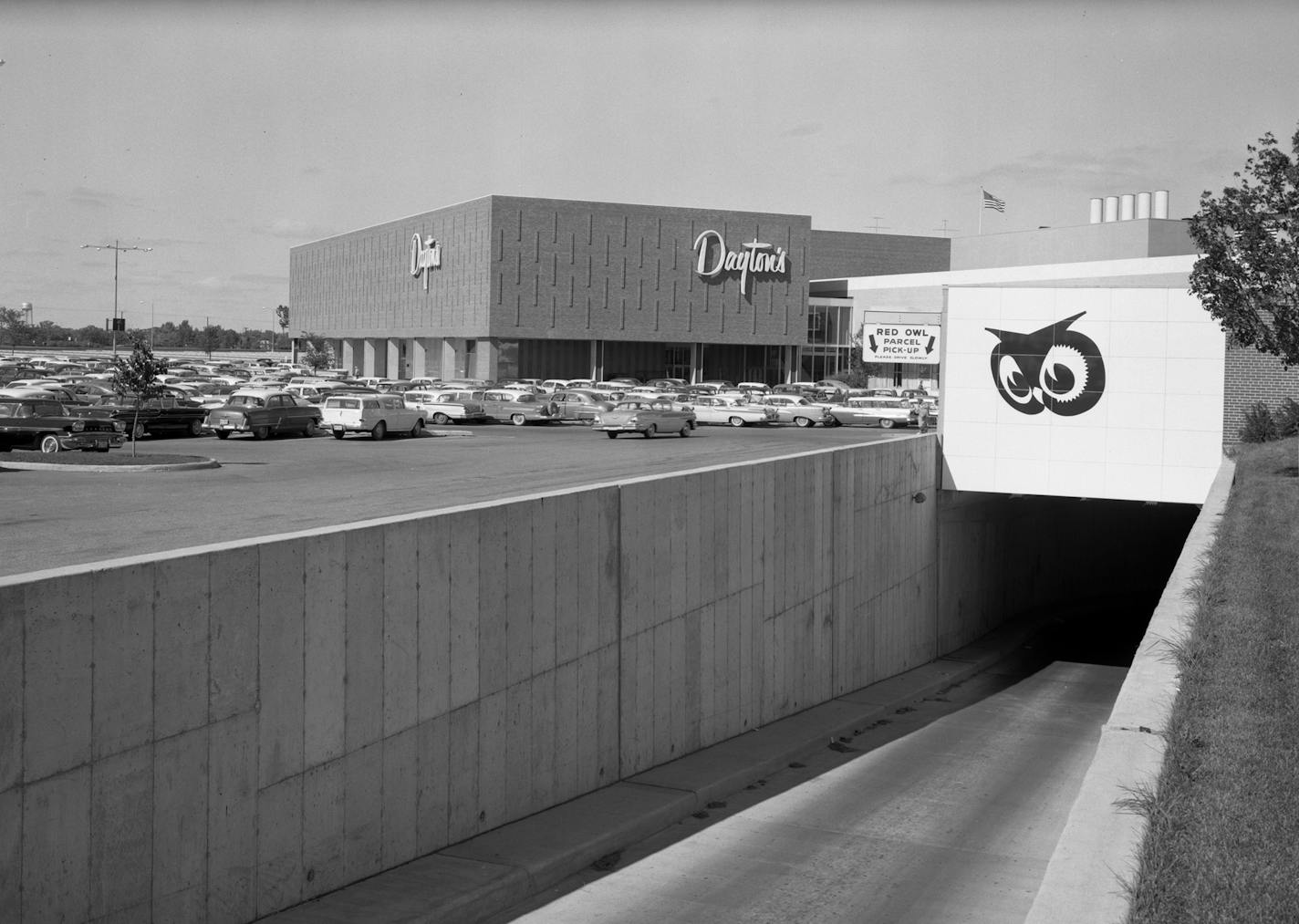 Driveway leading to Red Owl loading dock, below Southdale Center parking lot, Edina.