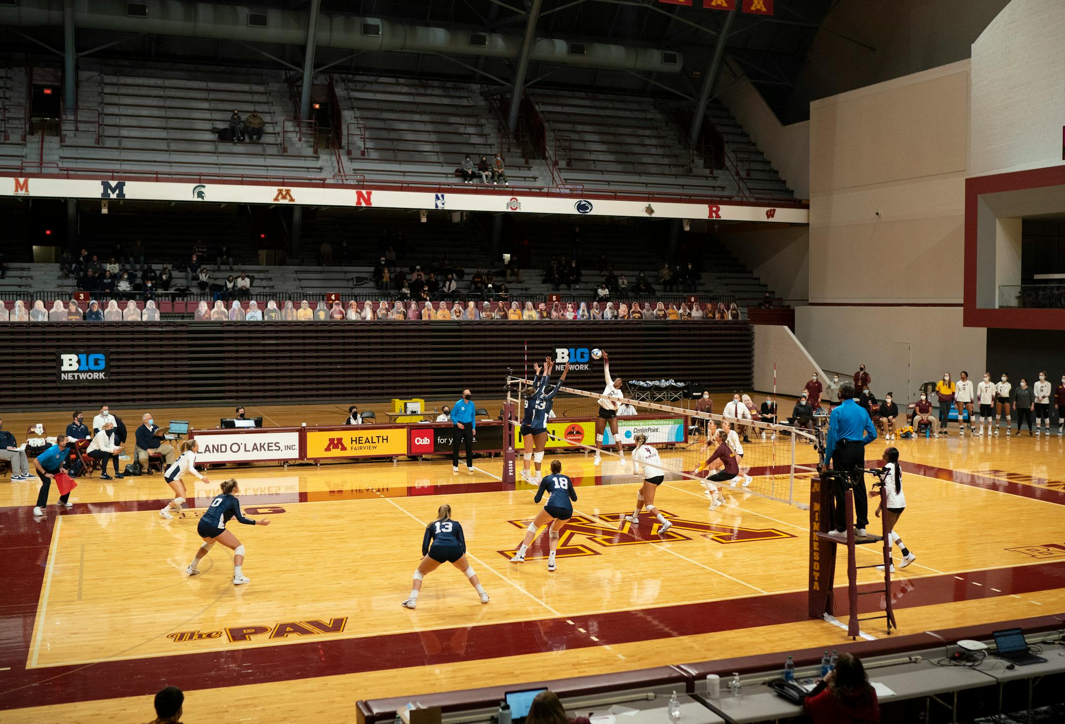 Minnesota Gophers opposite hitter Stephanie Samedy (10) spiked the ball early in the first game while Penn State Jonni Parker setter (9) and middle blocker Kaitlyn Hord (23) defended. ] JEFF WHEELER • jeff.wheeler@startribune.com