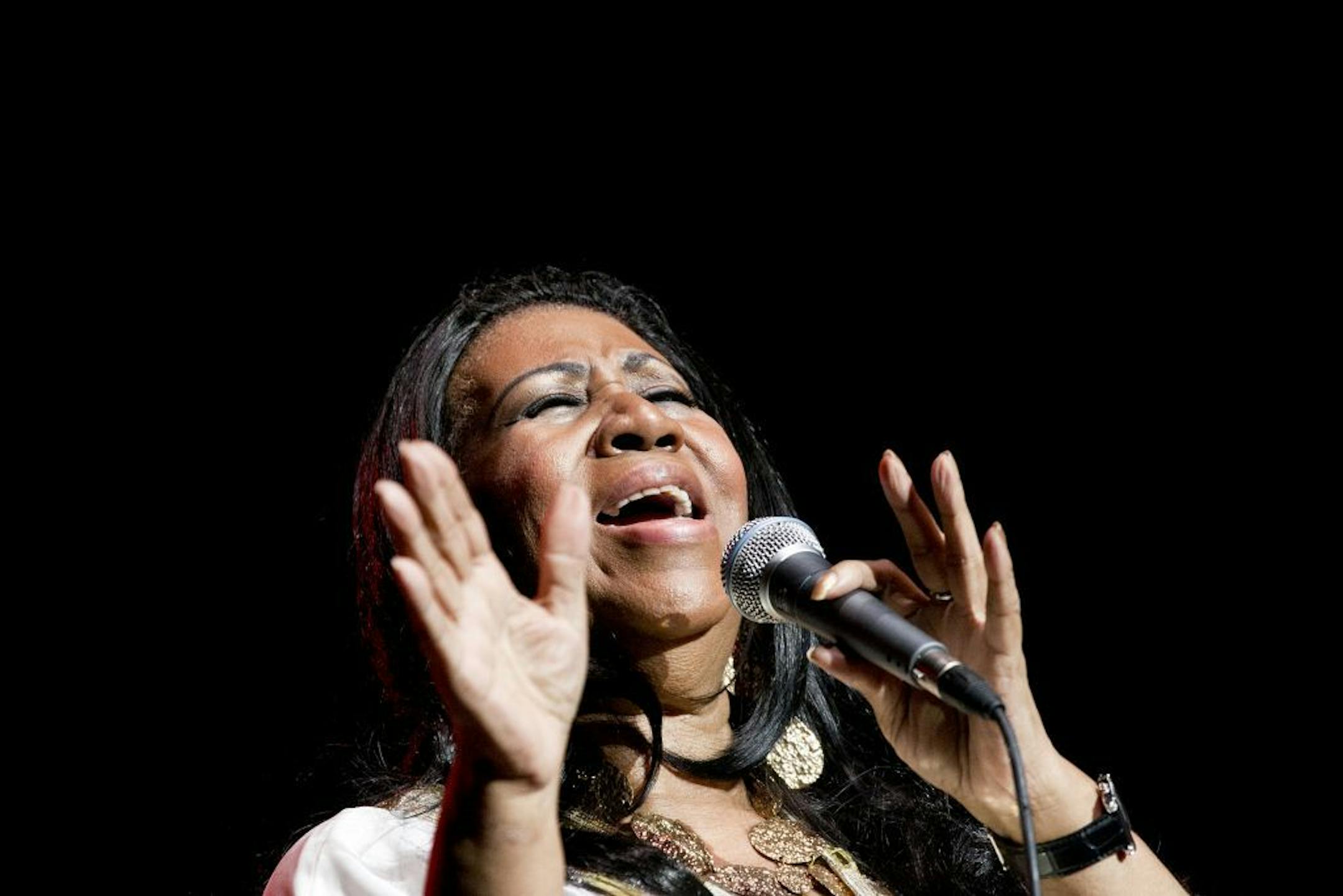 Aretha Franklin performs at the Jones Beach Theater in Wantagh, N.Y., July 27, 2011. After canceling six months of public appearances for medical problems, on Wednesday night, Franklin returned to the stage and performed at a concert with accompanying musicians including her son Teddy Franklin on guitar.