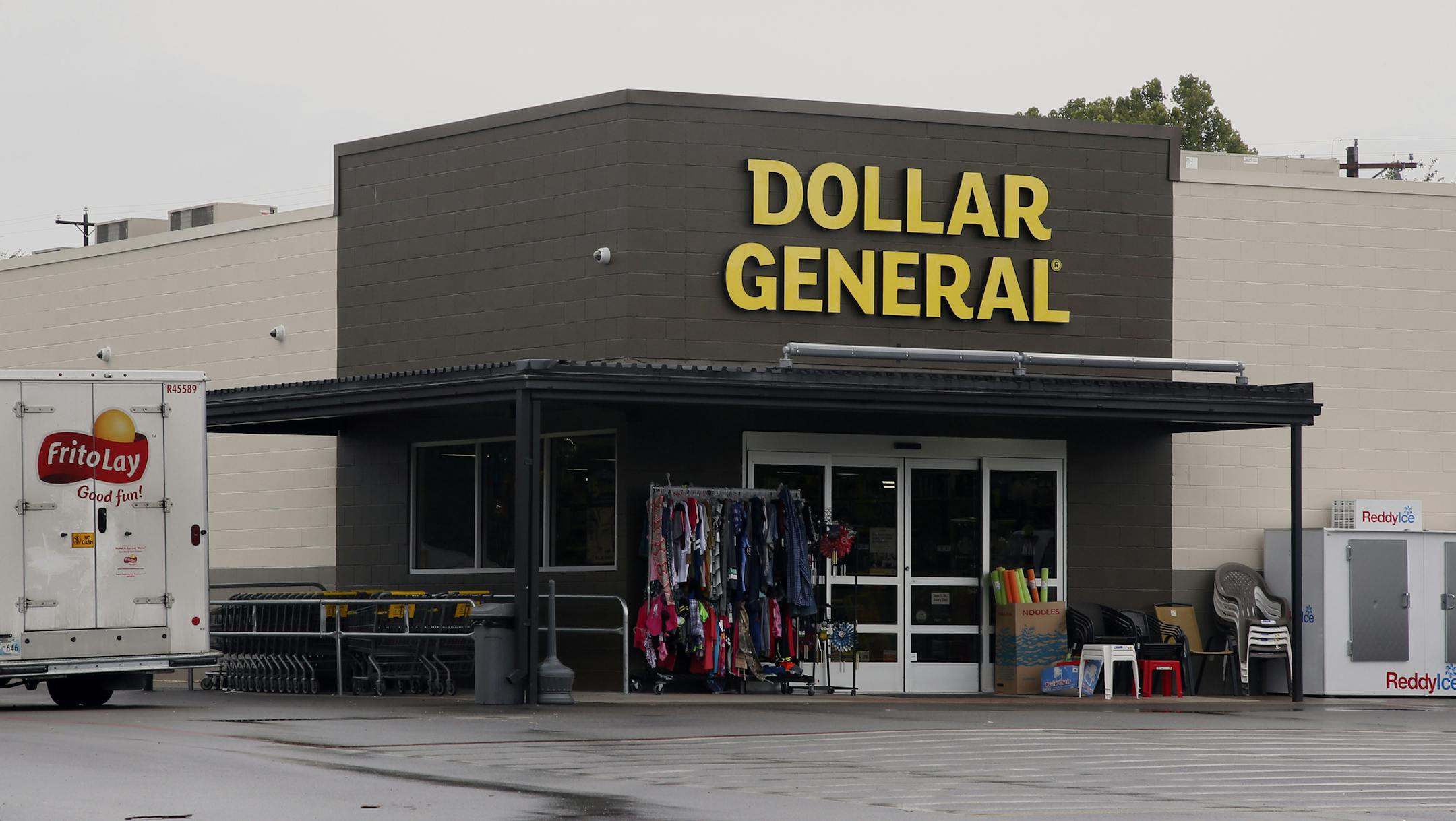 FILE- This Aug. 3, 2017, file photo shows a Dollar General store in Luther, Okla. Dollar General Corporation reports financial results Thursday, May 30, 2019. (AP Photo/Sue Ogrocki, File)