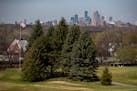 A view of downtown Minneapolis is one of the many features at St. Paul's Town and Country Club golf course.