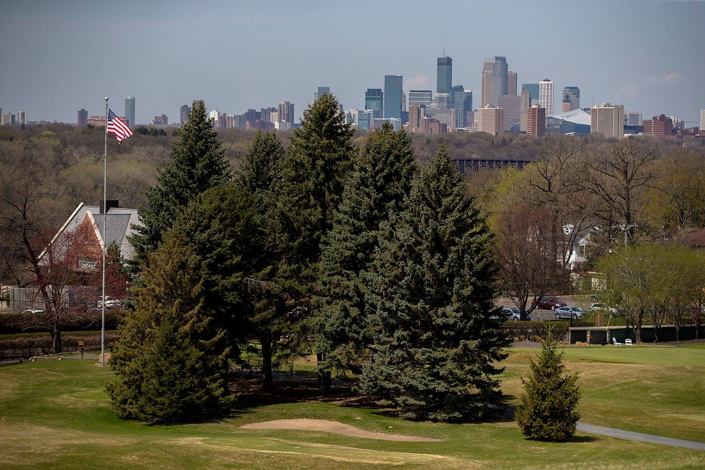 A view of downtown Minneapolis is one of the many features at St. Paul's Town and Country Club golf course.