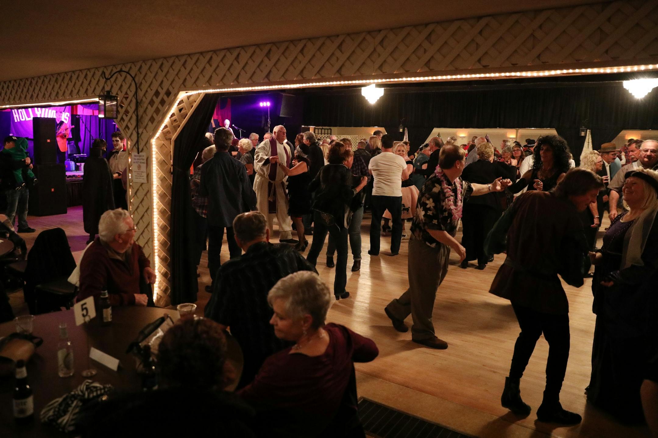 Some watched from tables surrounded the dance floor as others danced to the Rockin' Hollywoods.