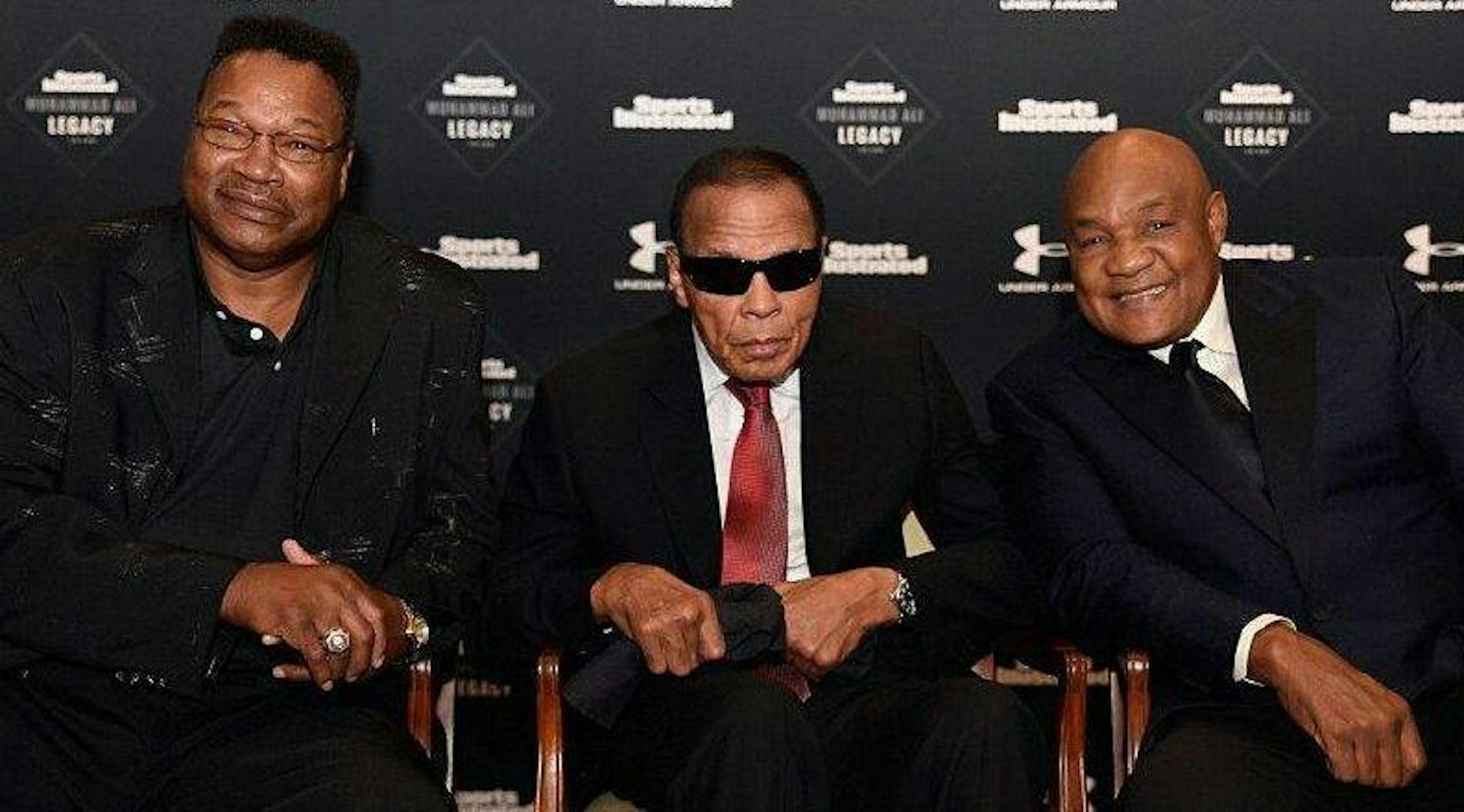 Heavyweight champs Larry Holmes, Muhammed Ali and George Foreman