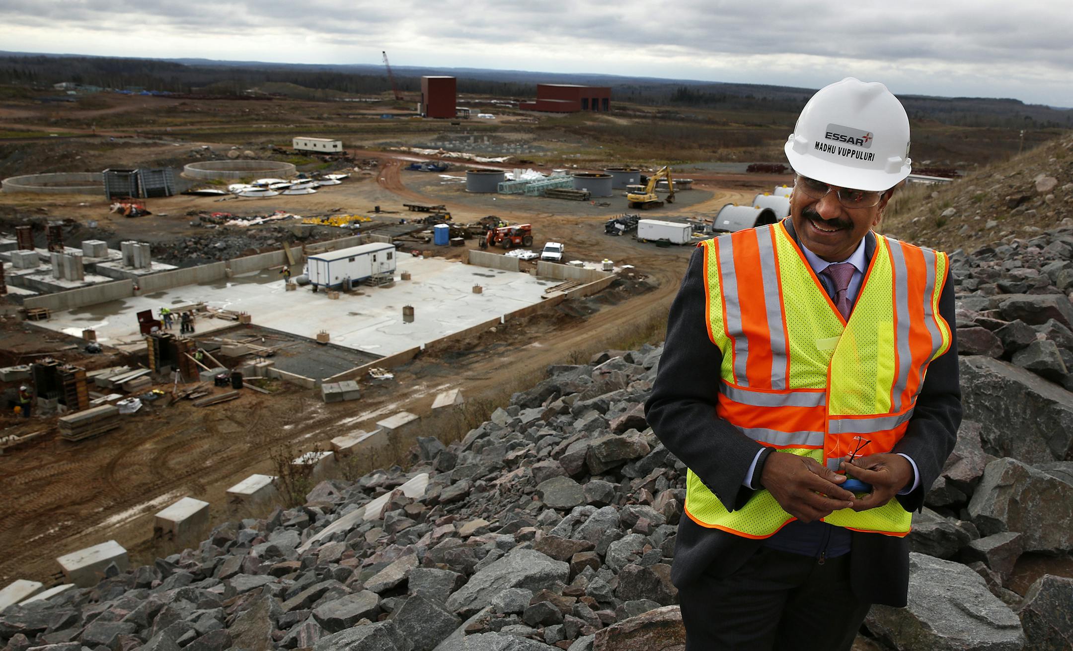 Madhu Vuppuluri, president and CEO of Essar Steel Minnesota, looks over the Essar Project in Nashwauk, Minn.