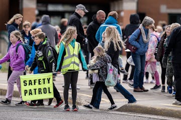 Parents pick up their children at Parkview Elementary School on the advice by police that they be picked up by a trusted member of the family in Chipp