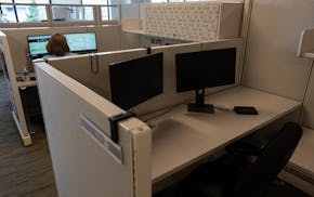 Hotel desks are part of the hybrid work environment at the Department of Natural Resources headquarters in St. Paul.