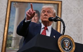 President Donald Trump takes questions from reporters at the White House on Wednesday.