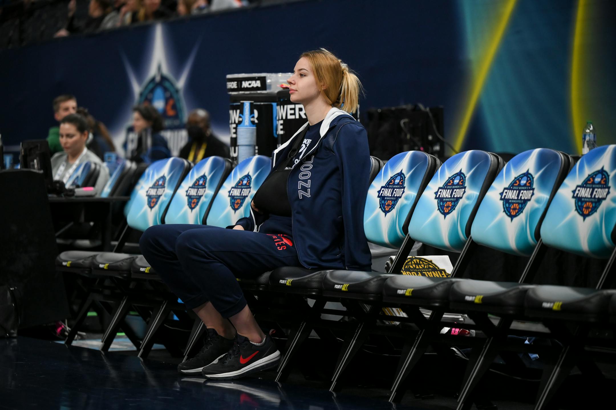 UConn forward Dorka Juhasz (14) looks on as she sits injured on the bench during a Final Four open practice held Saturday, April 2, 2022 at Target Center in Minneapolis, Minn.