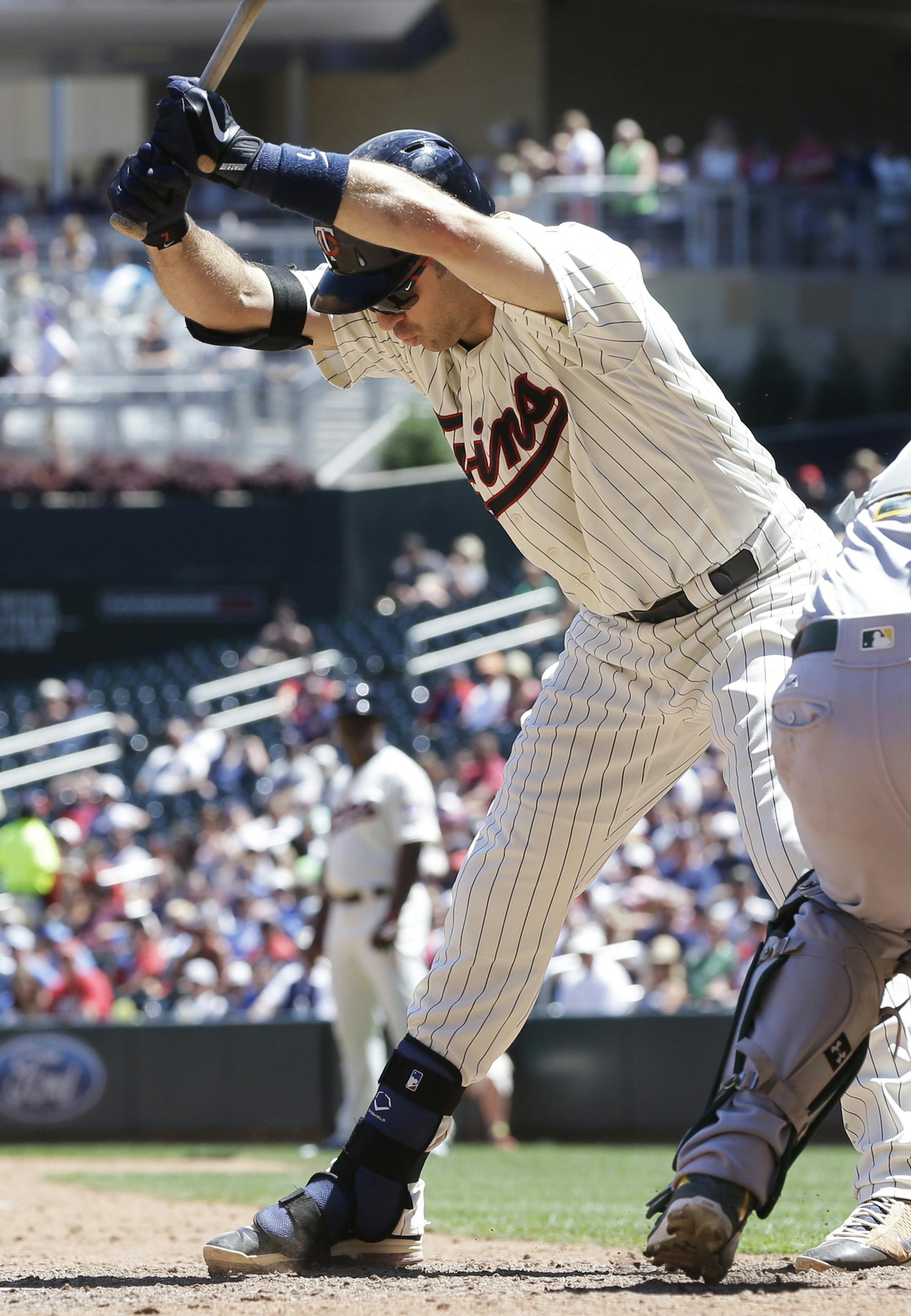 Minnesota Twinsí Joe Mauer avoids a close pitch by Oakland Athletics relief pitcher Marc Rzepczynski in the seventh inning of a baseball game Wednesday, July 6, 2016, in Minneapolis. (AP Photo/Jim Mone) ORG XMIT: MNJM10