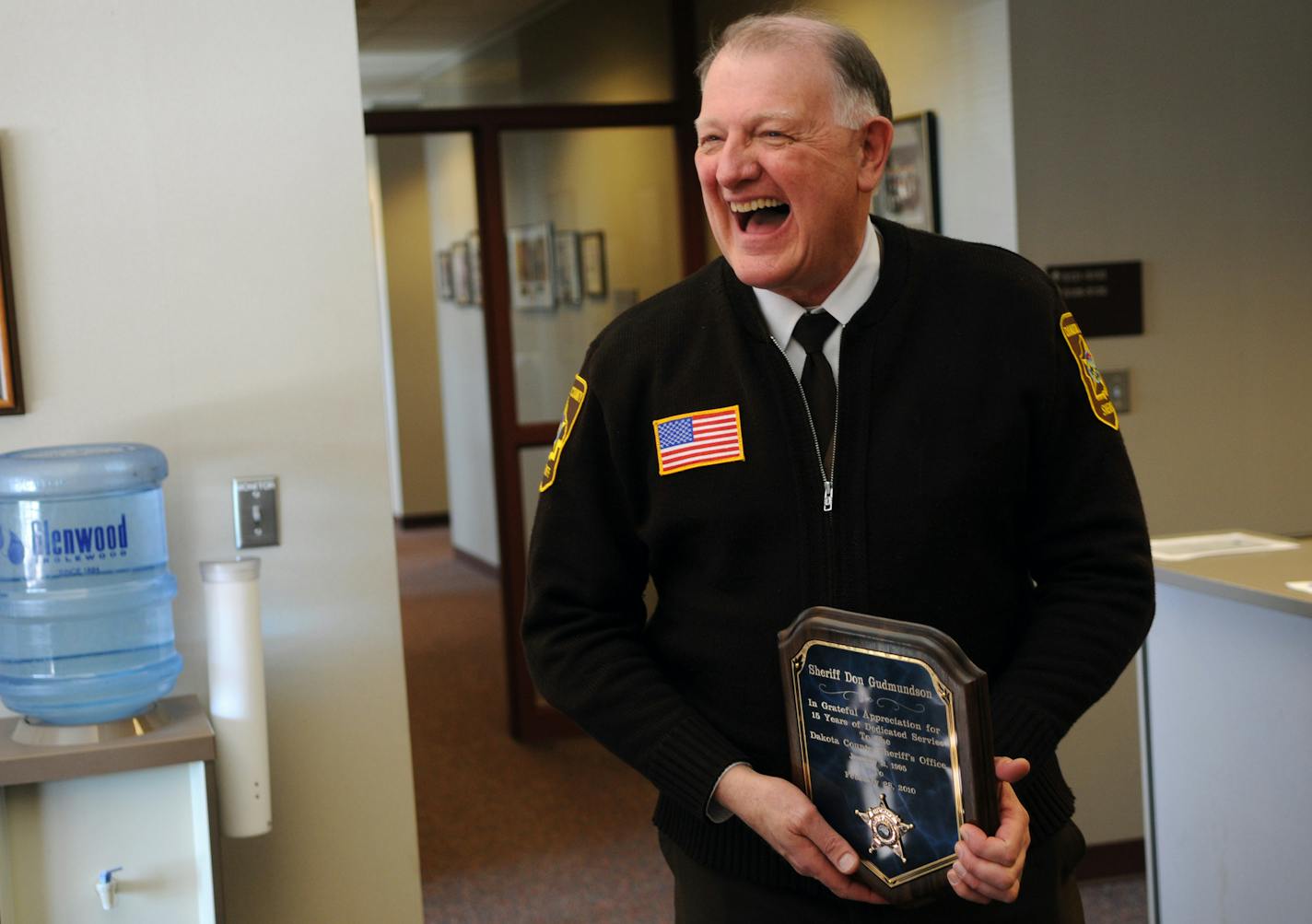 Richard Sennott&#x2022;rsennott@startribune.com] Hastings Mn. Friday 02/26/2010 Don Gudmundson has been in law enforcement for 40 years, and he's the only sheriff to ever serve in two Minnesota Counties. He got his start in Detroit, and went on to investigate mob crime in Chicago. He was serving his second term as Fillmore County sheriff when hired as Lakeville Police chief, and later, he became Dakota County sheriff. IN THIS PHOTO: ] Don Gudmundson laughs hard while taking some ribbing during a