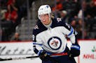 Winnipeg Jets right wing Patrik Laine plays against the Detroit Red Wings in the second period of an NHL hockey game Thursday, Dec. 12, 2019, in Detro