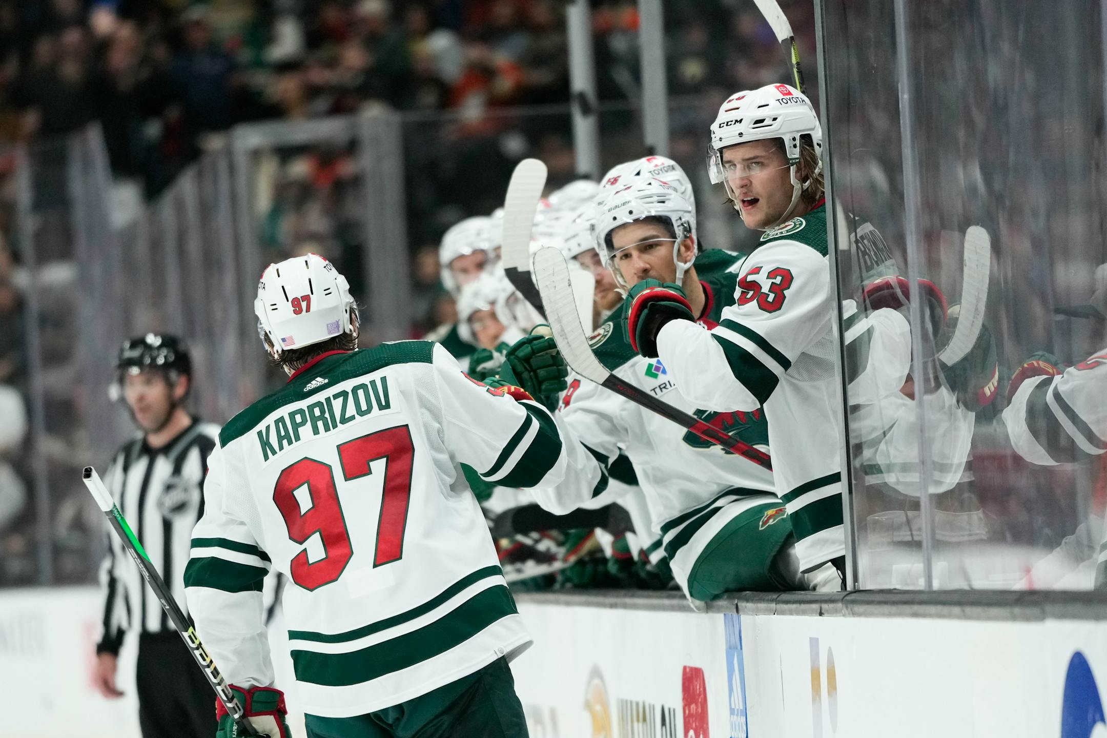 Minnesota Wild's Kirill Kaprizov celebrates his goal with teammates during the second period of an NHL hockey game against the Anaheim Ducks Wednesday, Nov. 9, 2022, in Anaheim, Calif. (AP Photo/Jae C. Hong)