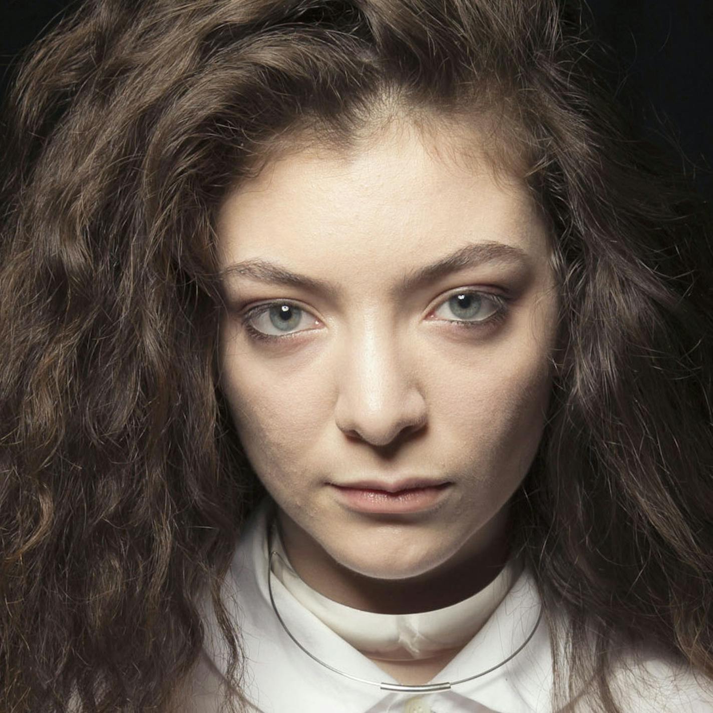 In this Nov. 8, 2013 photo, New Zealand singer Lorde poses for a portrait in New York. The 17-year-old singer has been anointed to the lofty position of pop&#xed;s newest princess thanks to her astute hit song, &#xec;Royals.&#xee; (Photo by Victoria Will/Invision/AP)