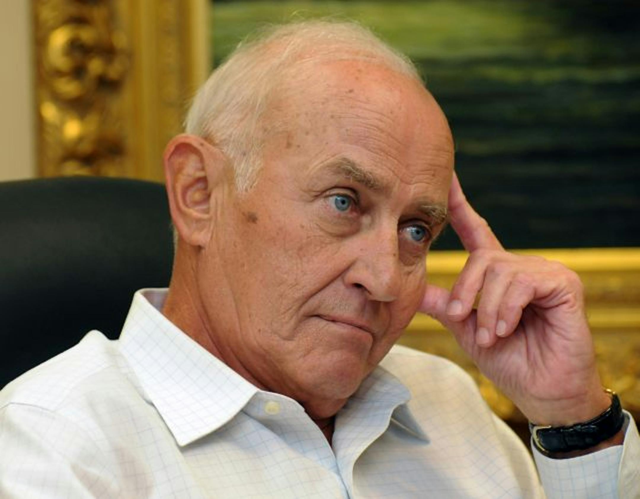 Dennis Mathisen is downsizing, but he still has business plans that involve financial products and more commercial real estate. "You can't be in business and not have ups and downs," he said. "This is a bigger down than I would have liked."