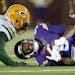 Vikings quarterback Teddy Bridgewater (5) was sacked for a ten yard loss by Green Bay Packers free safety Ha Ha Clinton-Dix (21) in the third quarter 