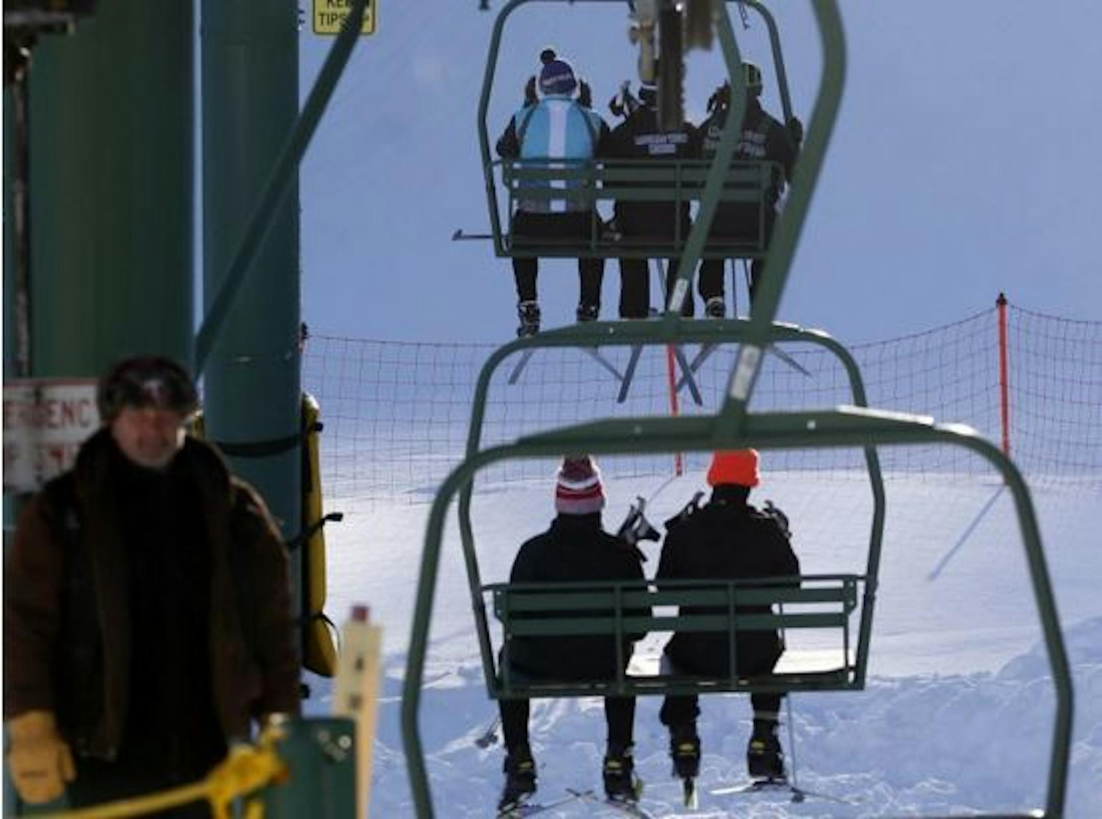 In this photo taken Feb. 10, 2016, skiers at Giants Ridge ride the chair lift in Biwabik, Minn. A new report by the Office of the Legislative Auditor suggests the structure of the Iron Range Resources and Rehabilitation Board (IRRRB) may be unconstitutional.