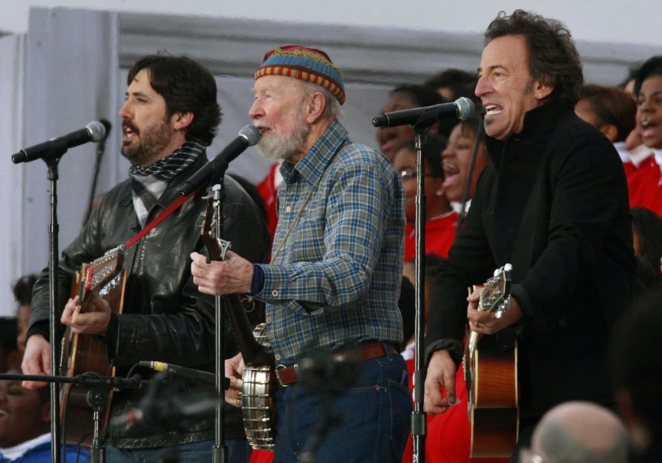 Tao Rodriguez-Seeger, left, Pete Seeger, center, and Bruce Springsteen perform at the Obama Inauguration Celebration on the steps of the Lincoln Memorial, Jan. 18.