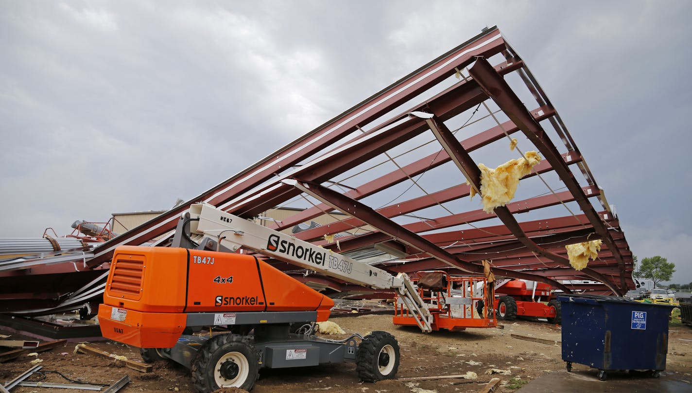 An airplane hangar under construction and owned by Red Wing Aeroplane Company at the regional airport was leveled after a storm roared through Red Wing, Minnesota. Another hangar had part of the roof ripped off, the hangar door pushed in and destroyed the nose of a private plane. Photos of the damage were taken on Tuesday, August 28, 2018. ] Shari L. Gross &#xef; shari.gross@startribune.com An airplane hangar under construction at the regional airport was leveled after a storm roared through Red