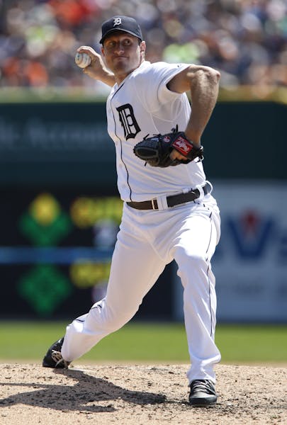 Detroit Tigers starter Max Scherzer pitches against the Kansas City Royals in the sixth inning of a baseball game Sunday, Aug. 18, 2013, in Detroit. (