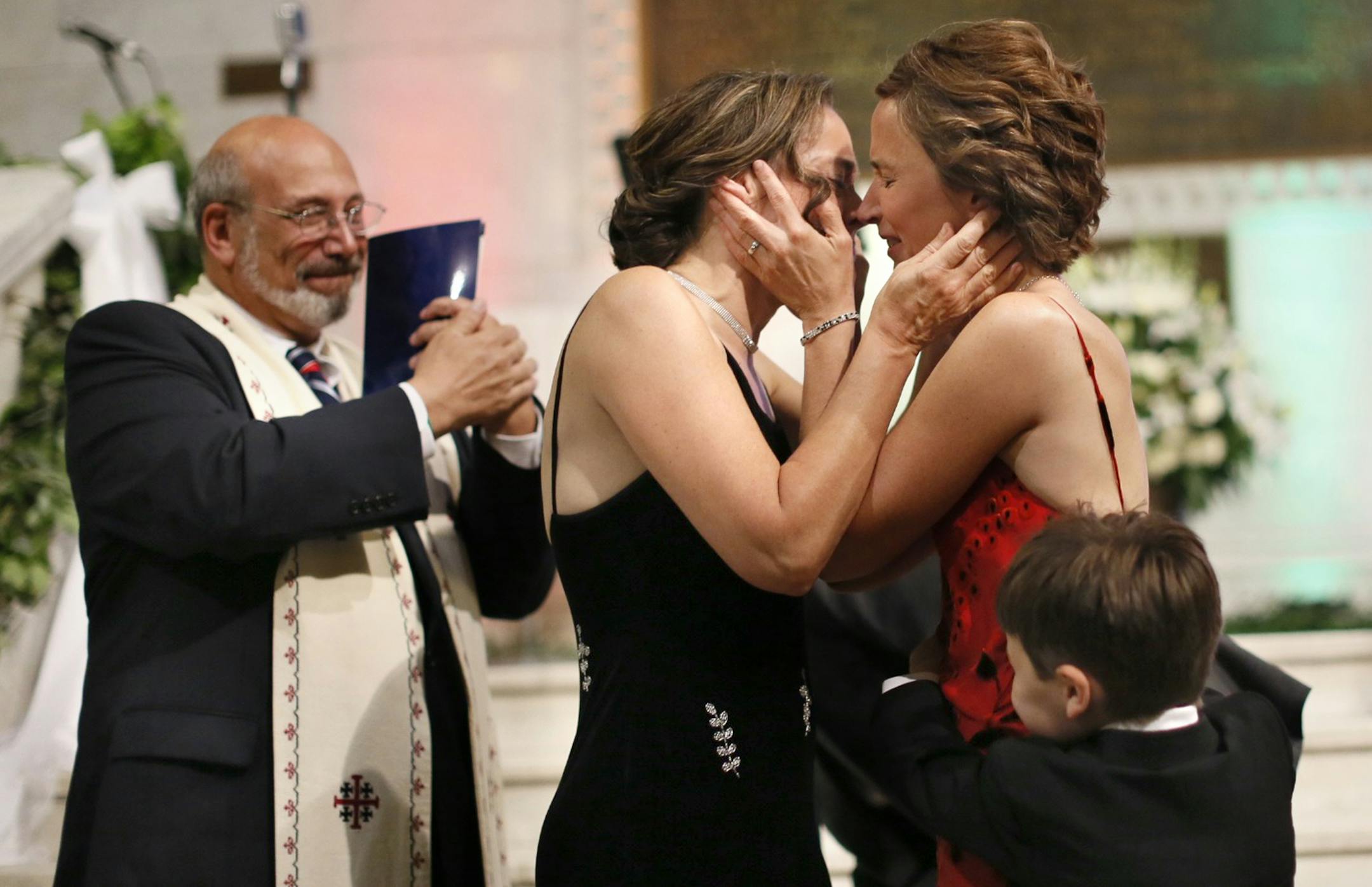 Same-sex couple Margaret Miles and Cathy ten Broeke were married just after midnight on the steps of the Rotunda at Minneapolis City Hall by Mayor R. T. Rybak. Hundreds of family, guests and supporters of the more than 60 same-sex couples scheduled to be married at City Hall early August 1st<x-apple-data-detectors://0> gathered to celebrate the historic union.