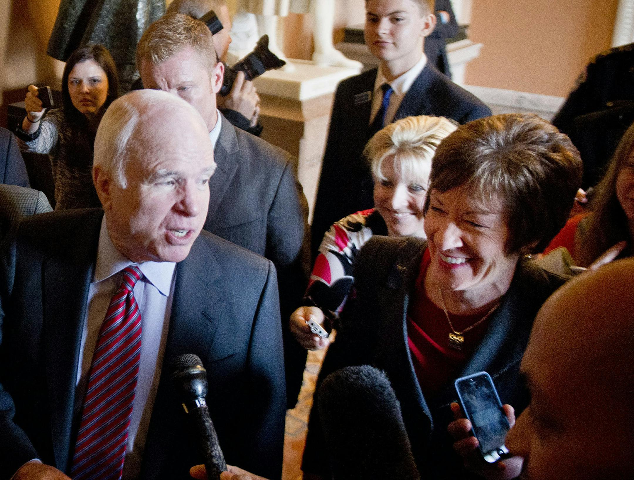 Sens. Susan Collins (R-Maine), right, and John McCain (R-Ariz.)