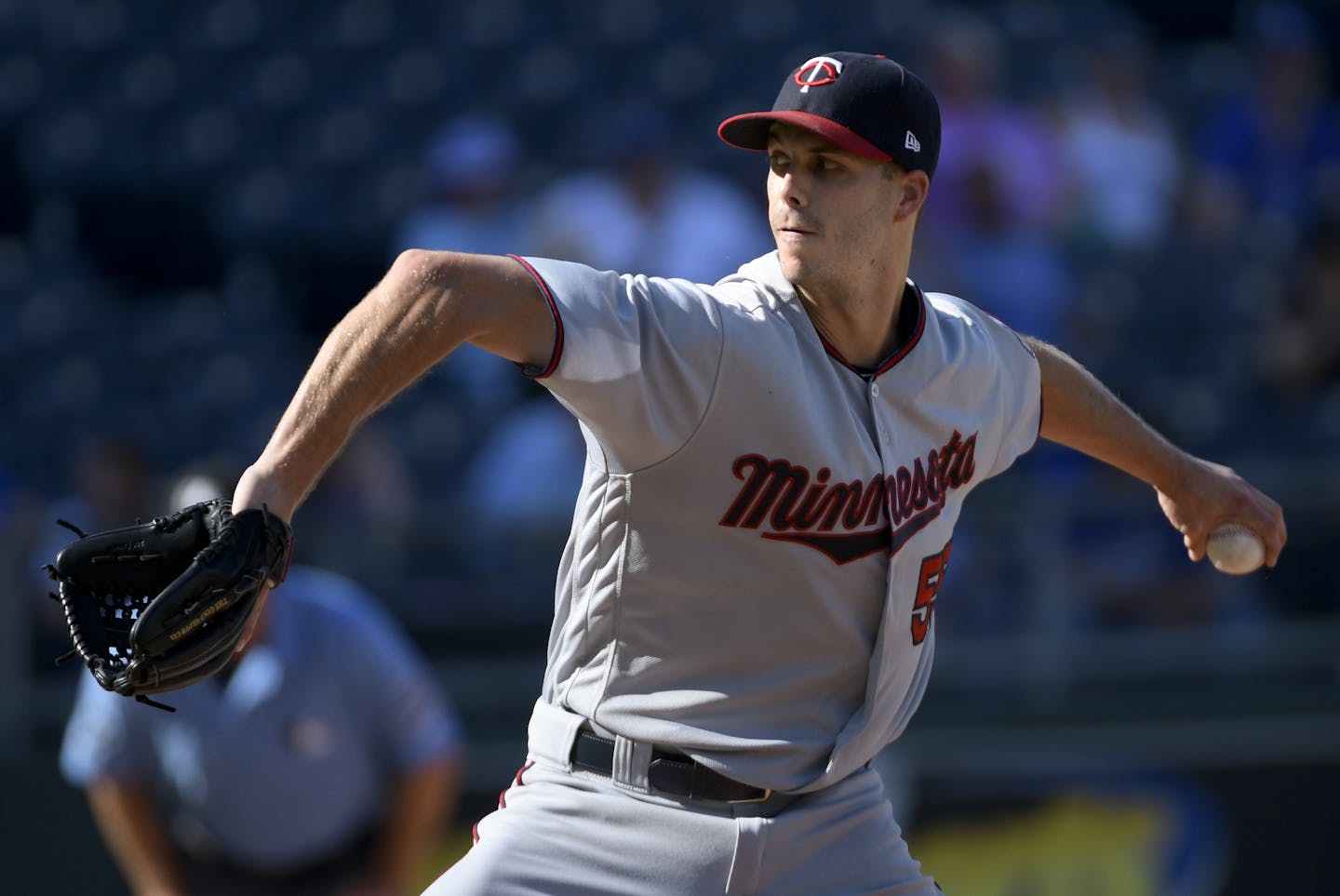 Minnesota Twins relief pitcher Taylor Rogers throws against the Kansas City Royals during the eighth inning of a baseball game in Kansas City, Mo., Sunday, Sept. 16, 2018. (AP Photo/Reed Hoffmann)