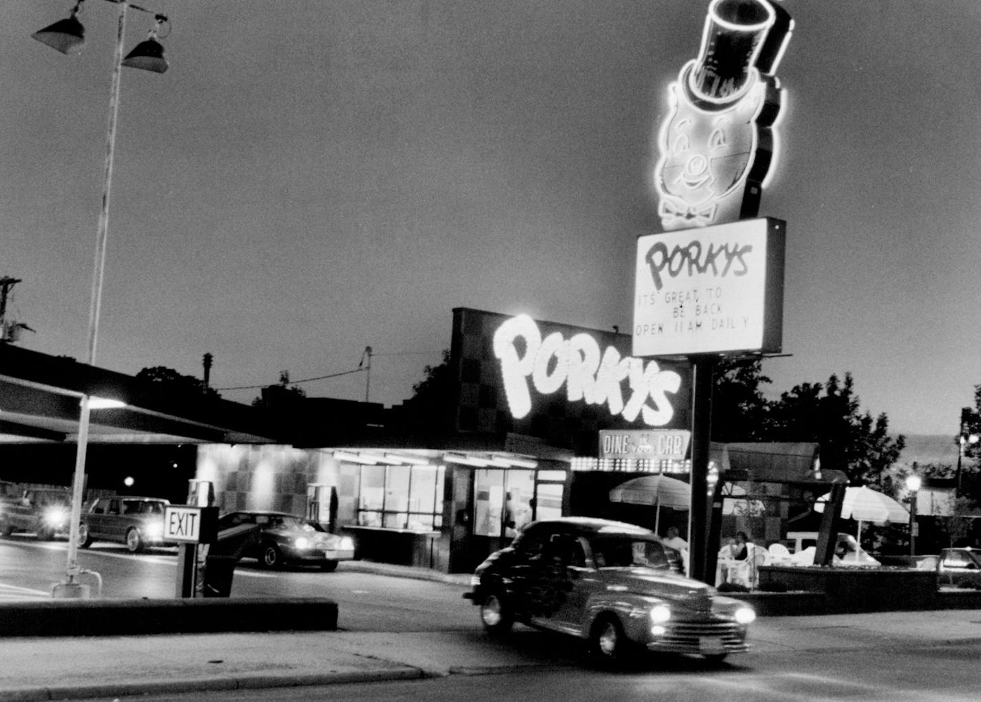 June 29, 1990 A lot of beautiful restored hot rods and '50s vintage cruisers are making the scene these days at Porky 's 1890 University Av., St. Paul. The recently reopeneddriv -in, a popular St. Paul hangout in the 50s and &#x201a;&#xc4;&#xf4;60s, has been handsomely restored itself, after shutting down in the late 70s for lack of business. The carhops are gone, and the owners have added a drive-through window, but otherwise, it&#x201a;&#xc4;&#xf4;s a pretty faithful restoration. The menu is c