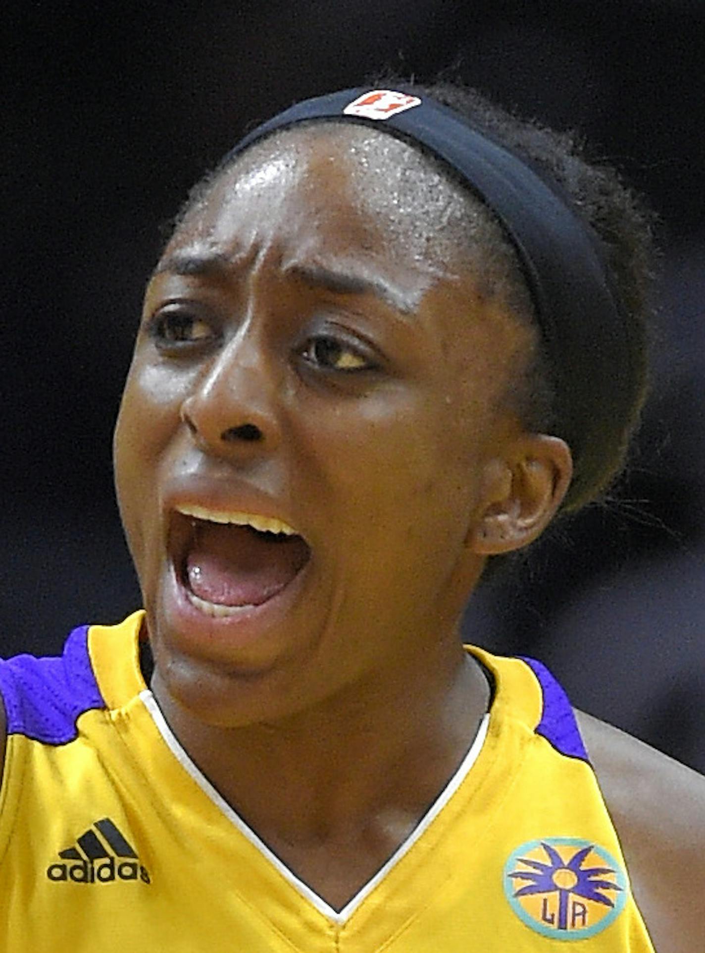 Los Angeles Sparks guard Alana Beard, left, celebrates with forward Nneka Ogwumike during the second half of a WNBA basketball game against the Tulsa Shock, Thursday, Aug. 6, 2015, in Los Angeles. The Sparks won 84-57. (AP Photo/Mark J. Terrill)