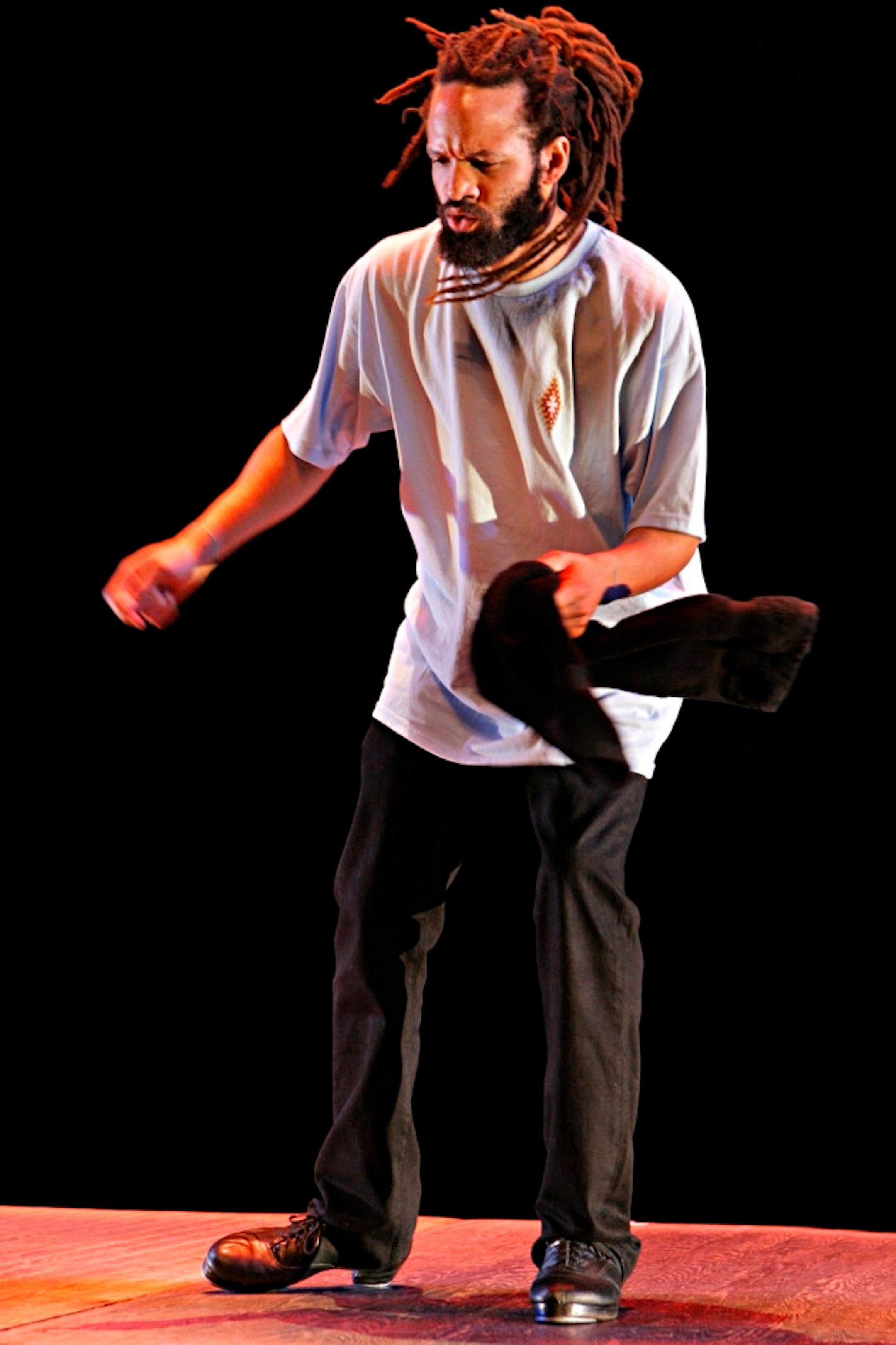 Savion Glover performs COWLES IMPROVOGRAPHY at the gala opening of The Cowles Center for Dance & the Performing Arts on September 9 & 10, 2011.