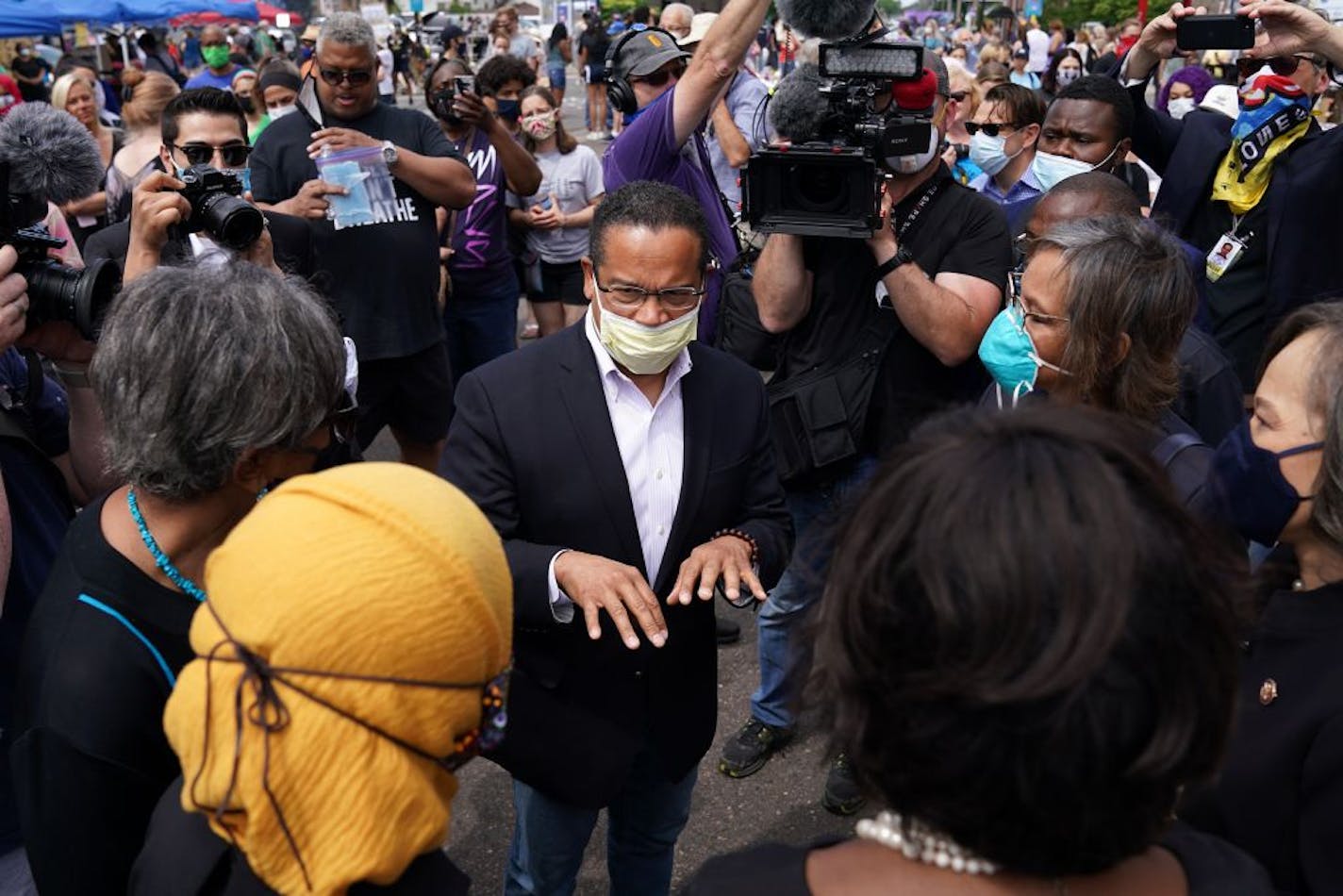 Sate Attorney General Keith Ellison spoke with Rep. Ilhan Omar and members of the United States Congressional Black Caucus as they visited the site of George Floyd's death Thursday in south Minneapolis.