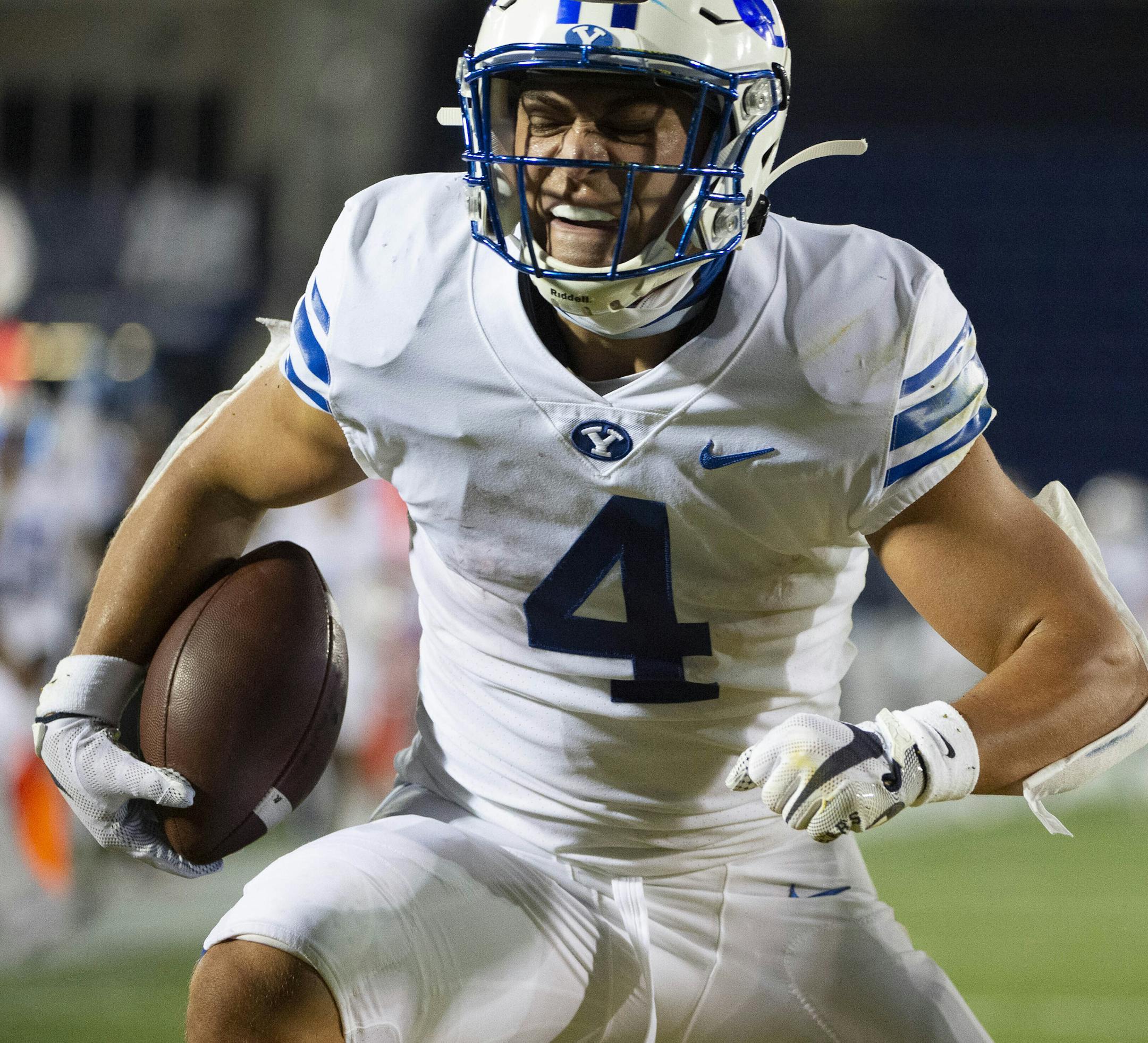 BYU's Lopini Katoa (4) reacts after scoring a touchdown during the first half of an NCAA college football game against Navy, Monday, Sept. 7, 2020, in Annapolis, Md. (AP Photo/Tommy Gilligan)