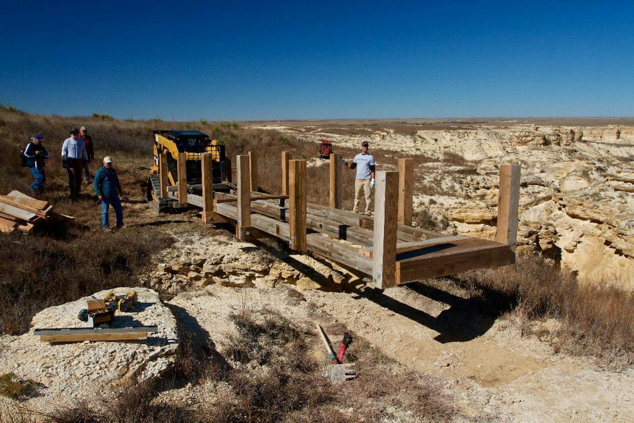 Volunteers helped cut trails at Little Jerusalem Badlands State Park, including a 1,200-foot path to an overlook, and a 1½-mile rim trail that includes a bridge over a chasm between rocks. These trails will allow visitors to experience a variety of perspectives on the ancient rocks, as well as the plants and wildlife that flourish in an area that usually gets less than 12 inches of precipitation a year.