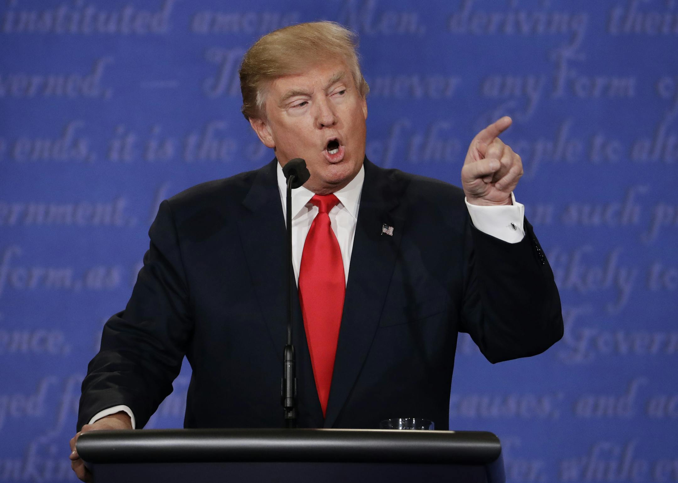 Republican presidential nominee Donald Trump speaks to Democratic presidential nominee Hillary Clinton during the third presidential debate at UNLV in Las Vegas, Wednesday, Oct. 19, 2016. (AP Photo/David Goldman)