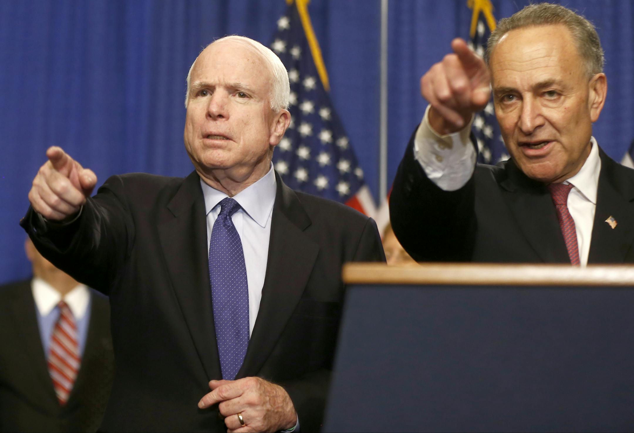 FILE - In this April 18, 2013 file photo, Sen. John McCain, R-Ariz., left, and Sen. Charles Schumer, D-N.Y. take questions during a news conference on immigration reform legislation, on Capitol Hill in Washington. House Republicans will take on the immigration issue in bite-size pieces, shunning pressure to act quickly and rejecting the comprehensive approach embraced in the Senate, House Judiciary Committee Chairman Rep. Bob Goodlatte, R-Va., said Thursday. (AP Photo/Charles Dharapak, File)
