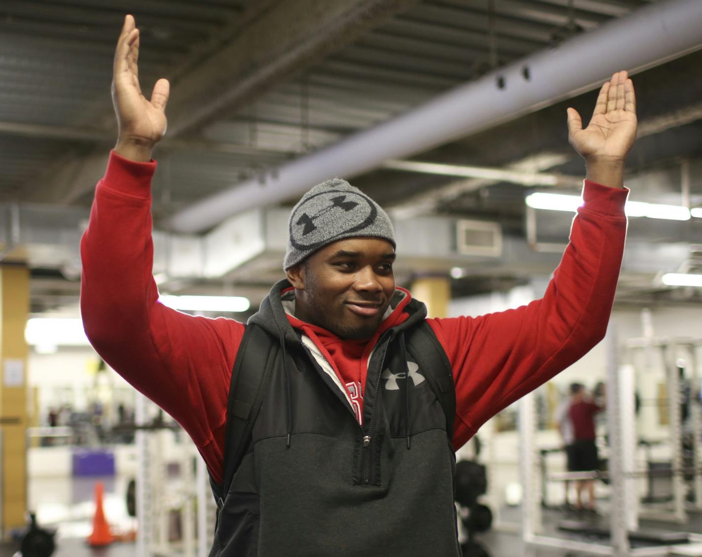 Jashon Cornell made the Ohio State University "O" sign for a couple of his former coaches during his last visit to the weight room Thursday afternoon at Cretin-Derham Hall in St. Paul. ] JEFF WHEELER &#xa5; jeff.wheeler@startribune.com Jashon Cornell, the highly recruited Cretin-Derham Hall football player, stopped by school Thursday afternoon, January 8, 2015, to say some goodbyes before leaving town this week. The senior graduated early from C-DH and will begin classes early at Ohio State Univ