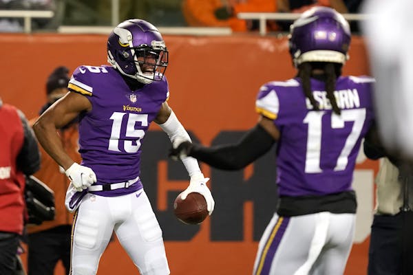 Minnesota Vikings wide receiver Ihmir Smith-Marsette celebrates his touchdown during the second half of an NFL football game against the Chicago Bears